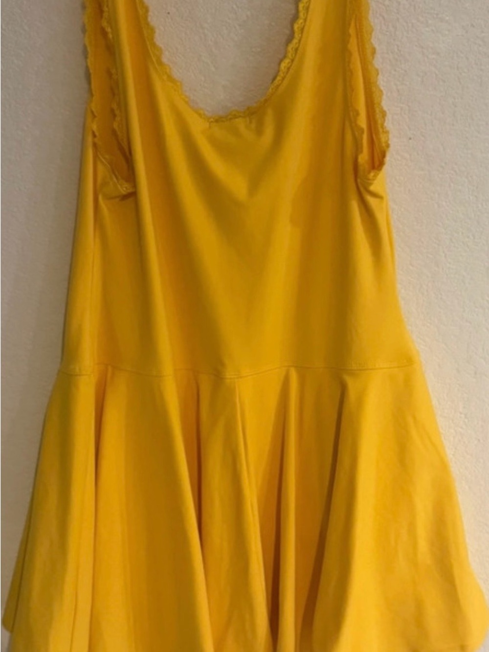 Woman’s Flattering Yellow Athletic Dress With Attached Shorts